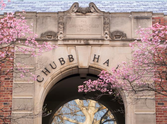 Chubb Hall is shown with colorful trees in front of the building, the building has the words "Chubb Hall" and "The Edwin-Watts-Chubb Library" on the wall