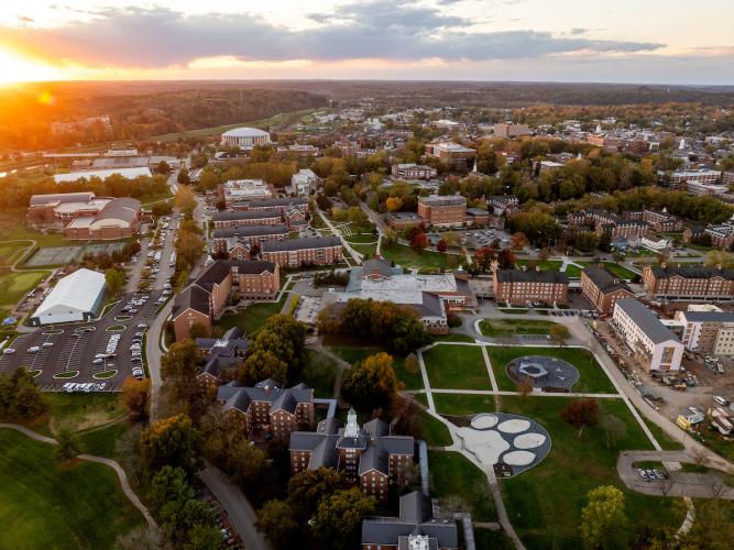 Ohio University's Athens campus and the countryside behind it is shown from above in this aerial image