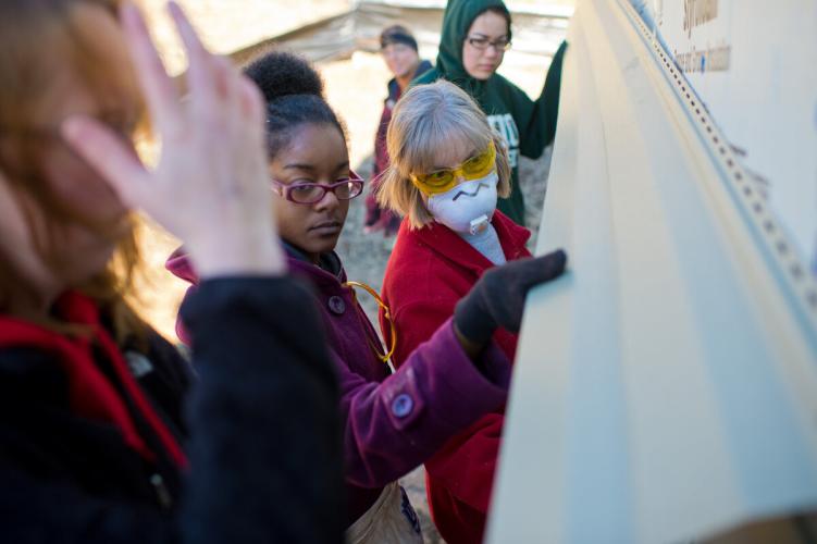 Students and community members work on the Bobcat Build