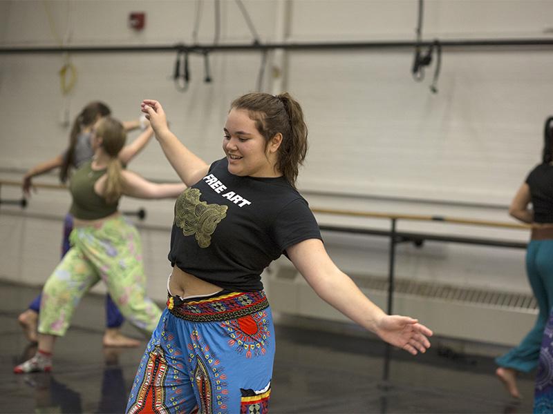 Student gestures in a dance class in Putnam Hall
