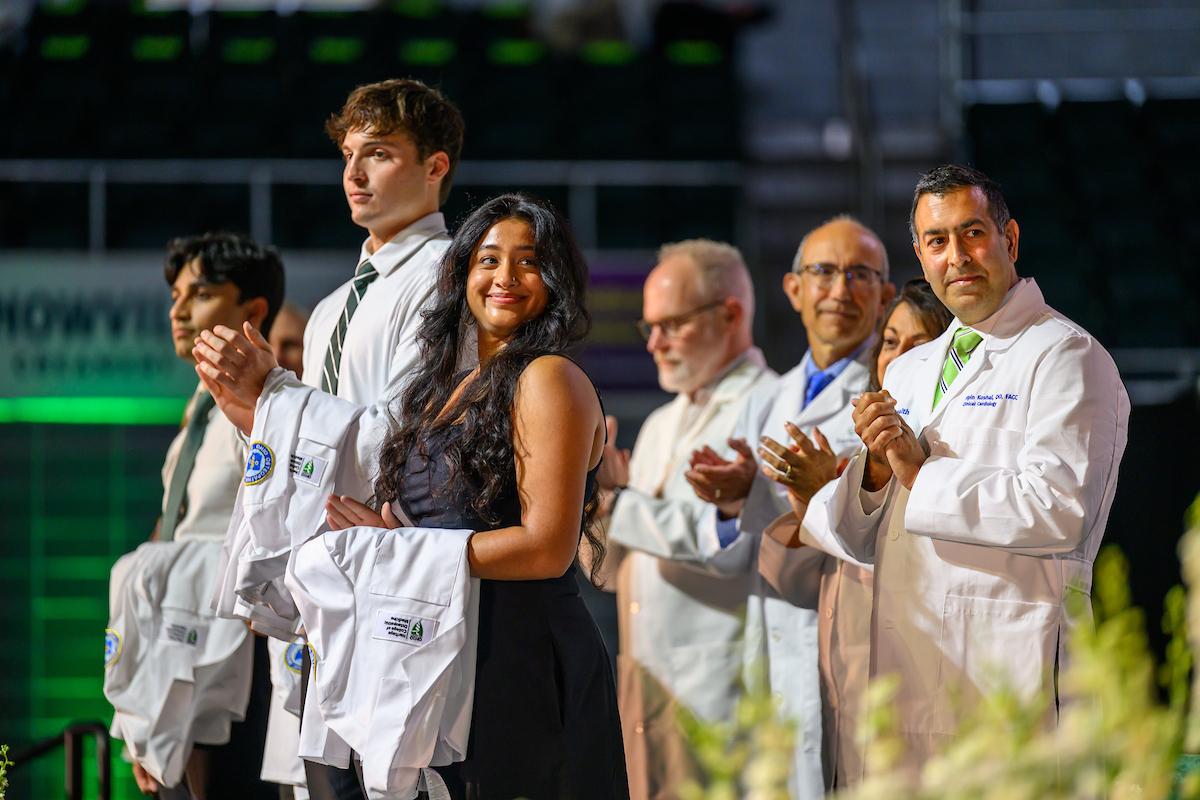 Class of 2029 students receive their white coat at convocation