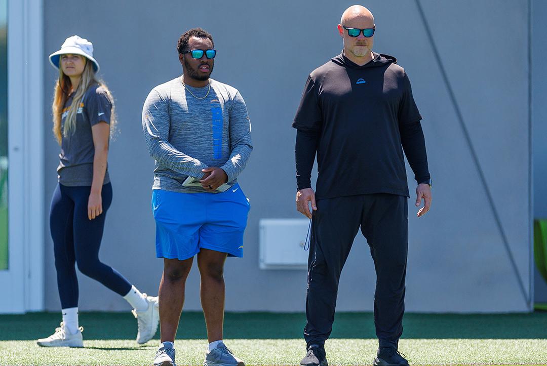 Bannerman-Oden (front left) observes a Chargers practice.