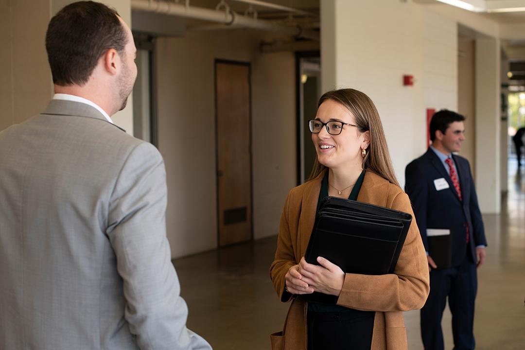 An OHIO sports administration student networks with a sports industry professional.