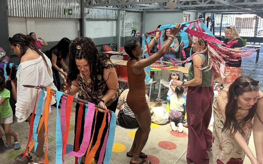 Several individuals work on arts and craft projects