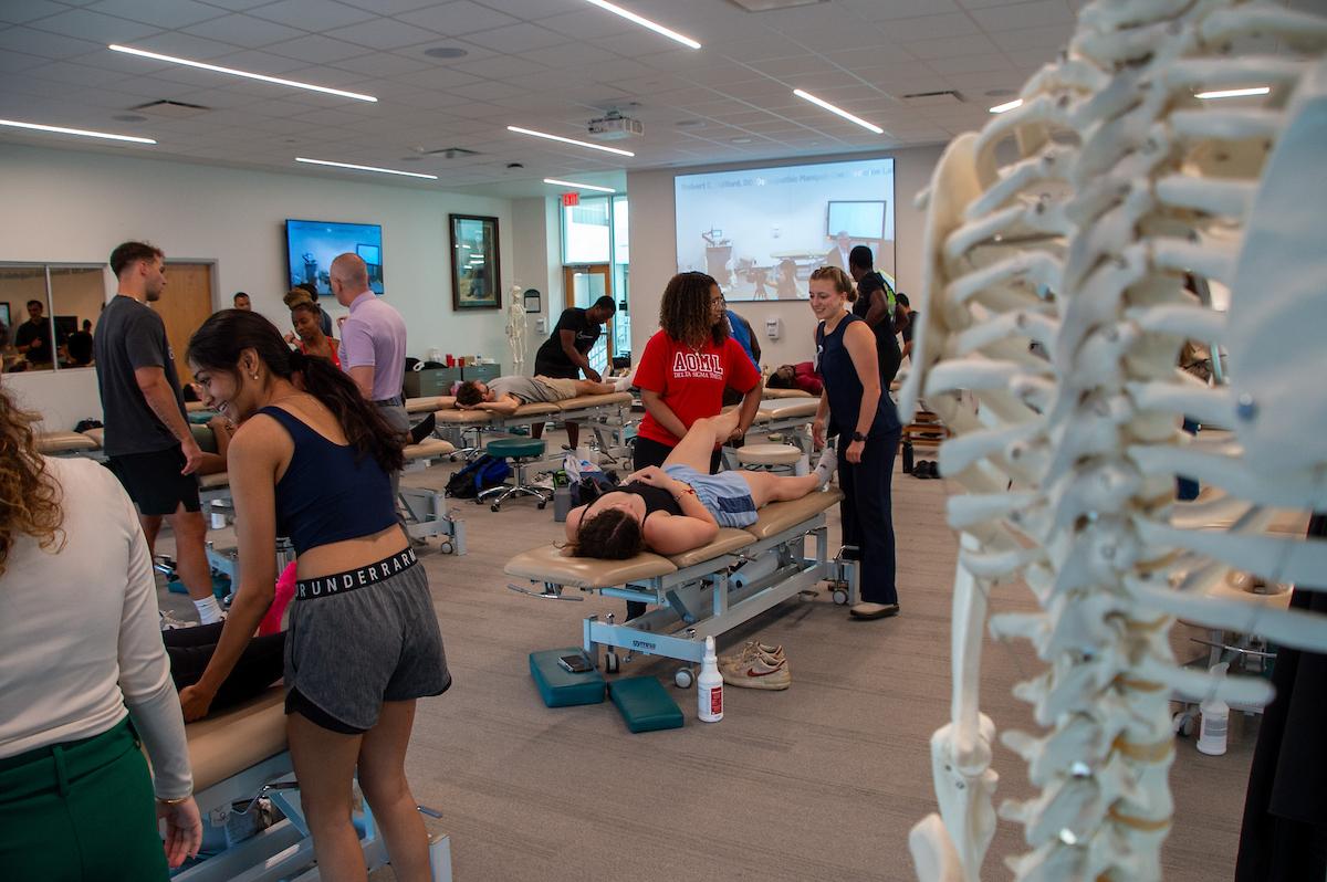 Summer Scholars students in the OMM lab