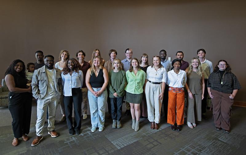 The students in the Environmental Studies master's degree program stand together for a photo