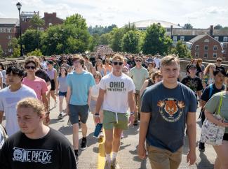 Students walk up Richland Avenue from the Convocation Center during Welcome Week Activities at Ohio University