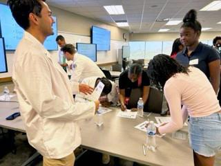 Students in the Become U program interact with medical students
