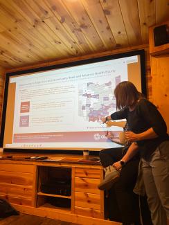 HCOM faculty member Jody Gerome presents at the Rural Health Scholars Retreat