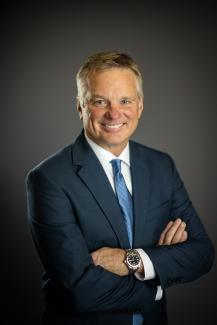 A headshot of David White