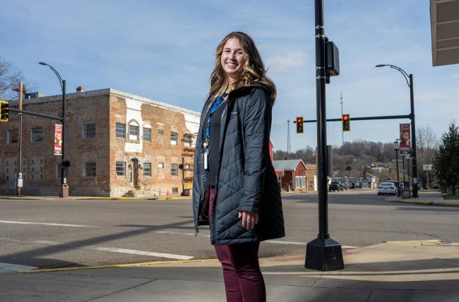 Lauren Nemeth, BSW '22, stands at an intersection in McArthur, Ohio.