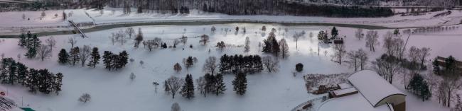 An aerial view of OHIO's Athens campus covered in snow