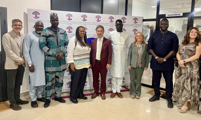 Ohio University representatives stand with officials from West Africa