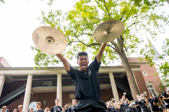 A member of the Marching 110 performs at the Student Organization Involvement Fair.