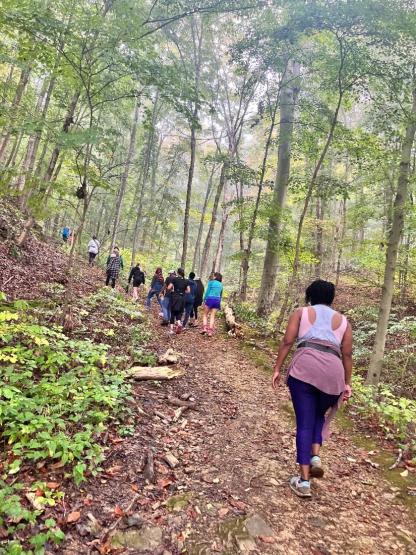 OHIO community members are shown hiking at the Ridges