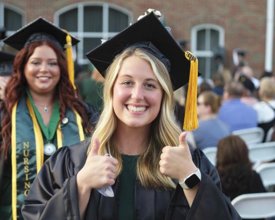 An OHIO graduate smiles at the Ohio University Southern Graduation Recognition Ceremony