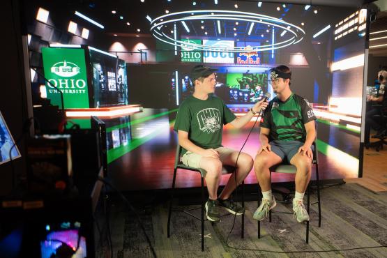 An OHIO esports broadcast member interviewing squad member after an event.