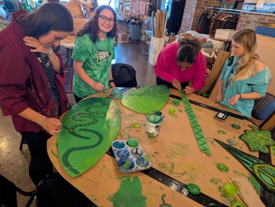 OHIO students painting at the PassionWorks studio