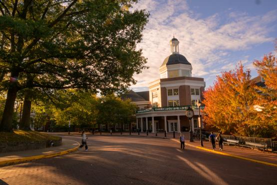 Baker University Center is surrounded by colorful trees on a Fall day