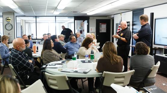 Members of the Mayors Partnership for Progress listen to a presentation