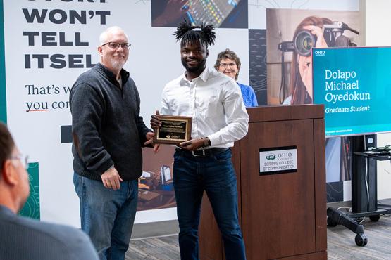 Dean Scott Titsworth and Dolapo Michael Oyedokun 