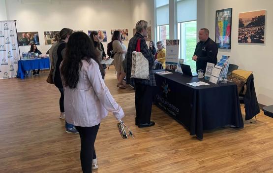 OHIO students and community members talk to representatives at booths at the Social Work Resource Fair at Ohio University Lancaster