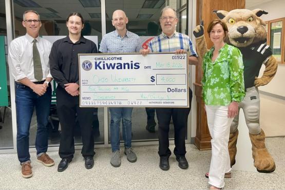 Representatives of the Chillicothe Kiwanis Club and Ohio University Chillicothe hold a giant check for $4,000 from the Kiwanis Club