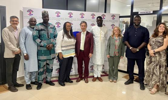 Ohio University representatives stand with officials from West Africa