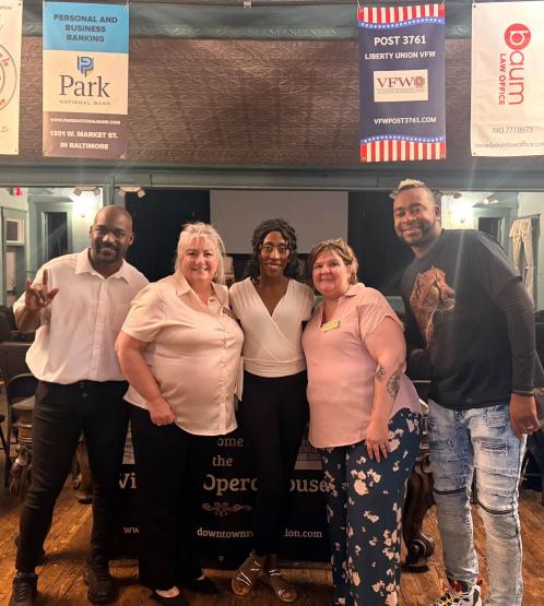 Heidi DeGrace stands with other presenters at a recent event