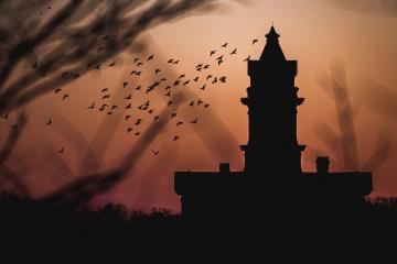 A spooky silhouette of an OHIO campus building 