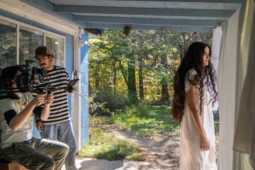 MJ Golzari and other crew members behind the scenes of "Pin"