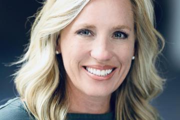 headshot of smiling woman with blonde hair