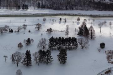 An aerial view of OHIO's Athens campus covered in snow