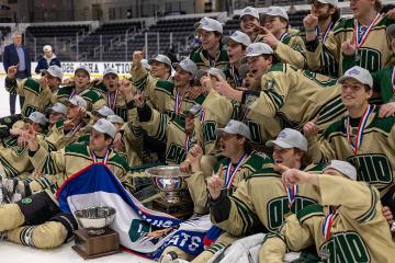 The 2025-26 OHIO Hockey team poses for a photo with the Murdoch Cup after winning the national championship tournament.