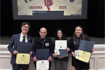 Jim Sand and OHIO students June Meehan, Megan Luckiw and Devin Lands are shown at the awards ceremony