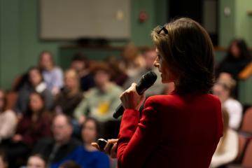 Sonya Pfeiffer speaks to an auditorium on Pre-Law Day 2026