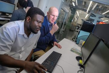 Jason Trembly (far right) and his students conduct applied research at OHIO’s Institute for Sustainable Energy and the Environment.