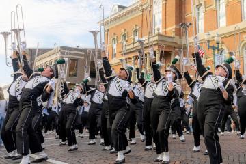 The Marching 110 performs during OHIO's Homecoming Parade.