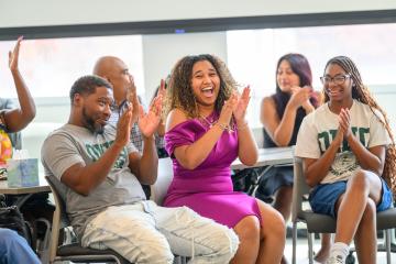 HCOM student and family celebrate scholarship