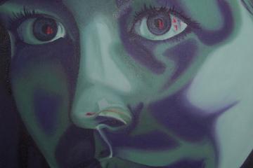 Painting of a blue face