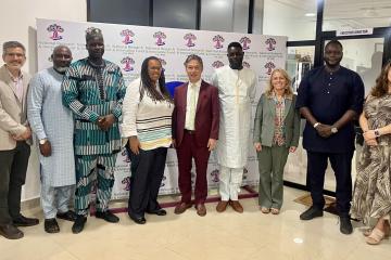 Ohio University representatives stand with officials from West Africa