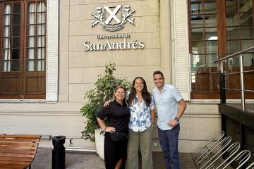 OHIO representatives stand outside of a building at the Universidad de San Andrés in Buenos Aires, Argentina
