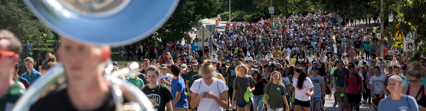 Students marching down a street