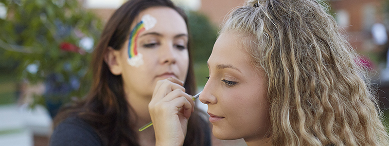 Student getting face painted