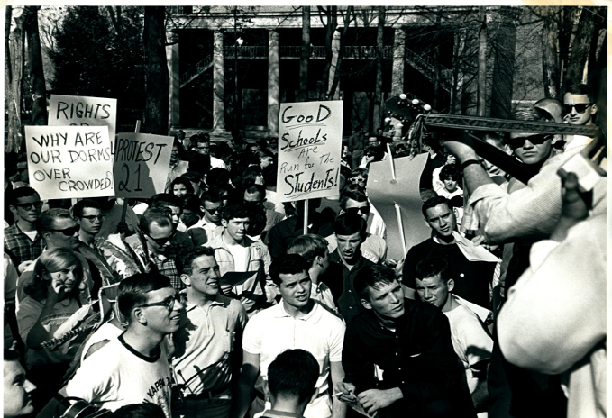 Students protest overcrowded dorms in 1964 on College Green