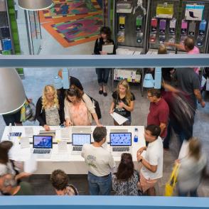 students looking at laptops in Bobcat Depot
