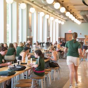 students eating in a dining hall