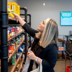 stocking the shelves in Cats' Cupboard