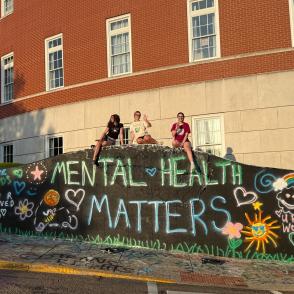 students painted the graffiti wall with "mental health matters"