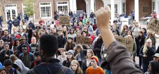 Students gather to protest outside Baker University Center